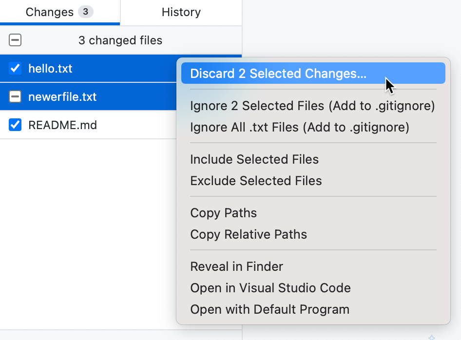 “更改”选项卡的屏幕截图。两个选定的文件以蓝色突出显示。 在上下文菜单中，光标悬停在“放弃 2 个选定的更改”上。