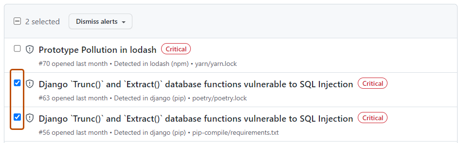 Dependabot alerts 视图的屏幕截图。 选择了两个警报，这些复选框以橙色边框突出显示。