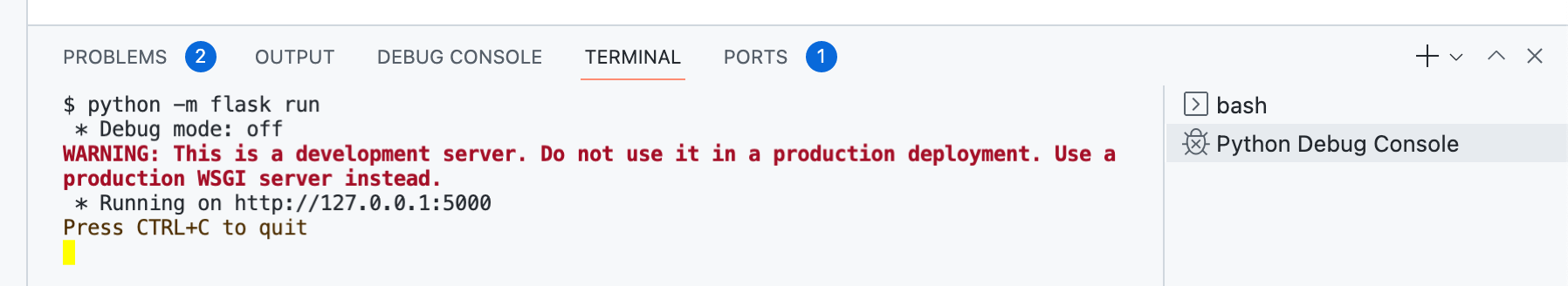 Capture d’écran de l’onglet Terminal avec la commande « python -m flask run » entrée et sortie, y compris « En cours d’exécution sur http://127.0.0.1:5000 ».